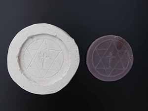 Symbol, Gußform für Wachs 